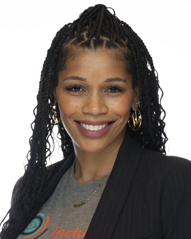 Corporate headshot on a white backdrop, shot at a Fate Media Creative booth